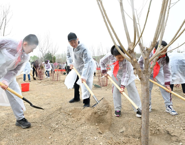 Xi Plants Trees in Beijing, Urging More Afforestation Efforts for Green Development, Building Beautiful China Xi Plants Trees in Beijing, Urging More Afforestation Efforts for Green Development, Building Beautiful China