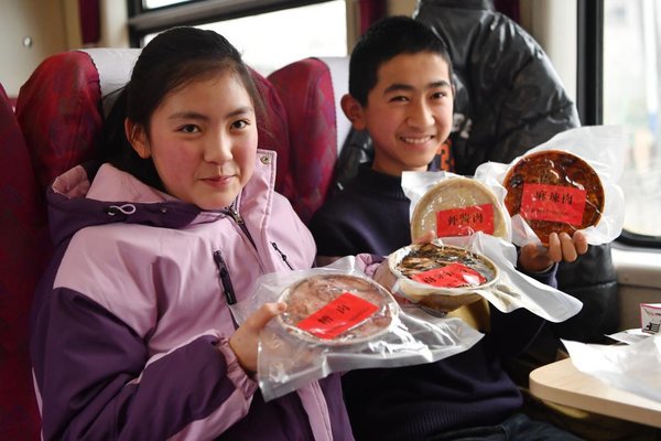 'Slow Trains' Facilitate People's Shopping for Upcoming Chinese Lunar New Year in NW China's Gansu