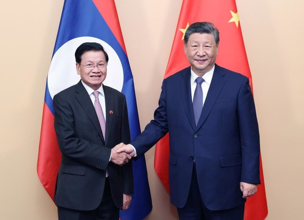 Xi Urges China, Laos to Forge Model for BRI Cooperation Xi Urges China, Laos to Forge Model for BRI Cooperation