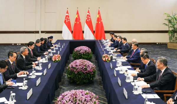 Xi Says China to March Hand-in-Hand with Singapore on Road of Modernization Xi Says China to March Hand-in-Hand with Singapore on Road of Modernization