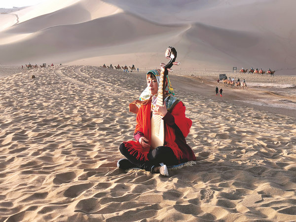 Pipa Player Breathes New Life into Ancient Dunhuang Scores Pipa Player Breathes New Life into Ancient Dunhuang Scores
