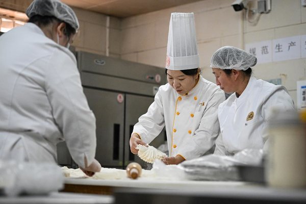 From Shaomai Chef to NPC Deputy: Serving People with Passion, Dedication From Shaomai Chef to NPC Deputy: Serving People with Passion, Dedication