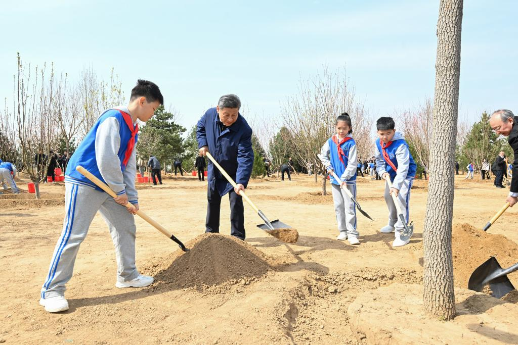 Xi Stresses Pooling Strength to Build Beautiful China Xi Stresses Pooling Strength to Build Beautiful China