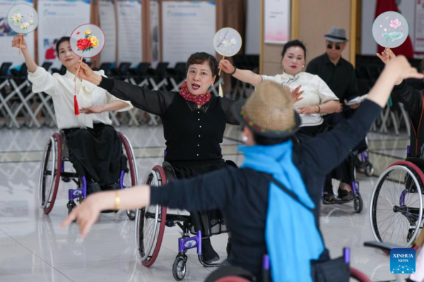 Wheelchair Dancers Light Up Life with Art
