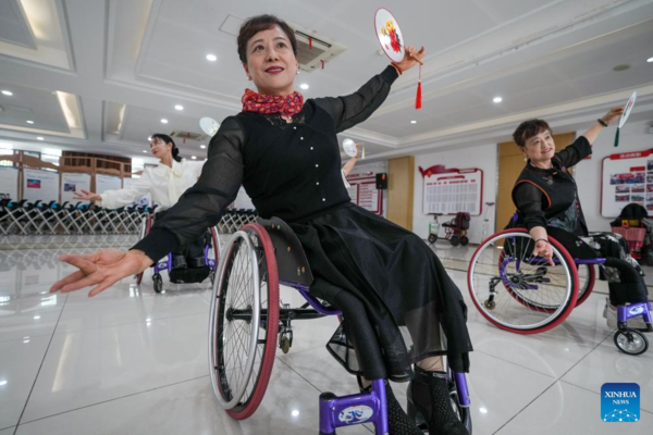 Wheelchair Dancers Light Up Life with Art