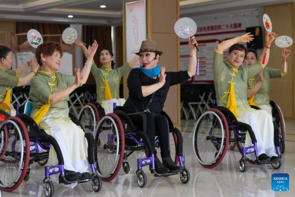 Wheelchair Dancers Light Up Life with Art